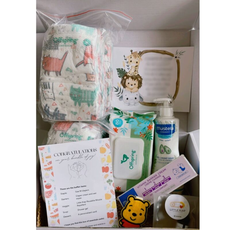 Newborn customised gift box includes diapers, wet wipes, shower gel, diaper cream, Little Kiap's winnie the pooh mosquito repellent and a personalised gift card.