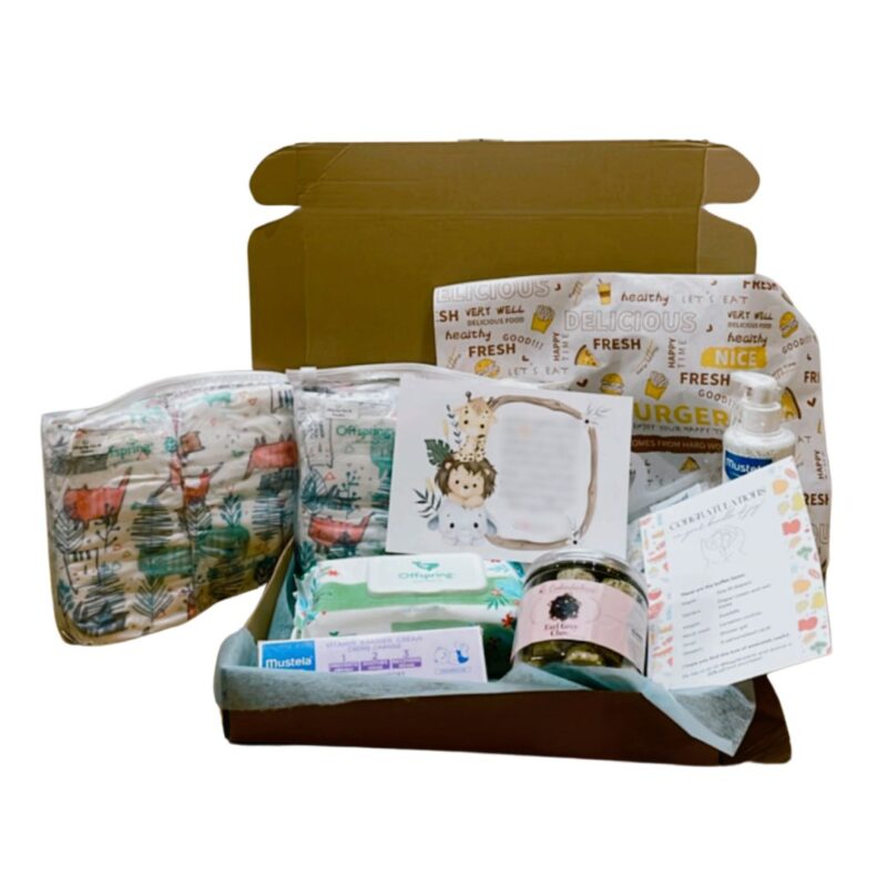 Newborn customised gift box includes diapers, lactation cookies, wet wipes, shower gel, diaper cream, and a personalised gift card.